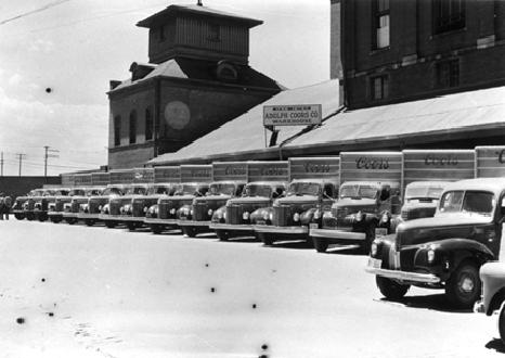 A Fleet Of Coors Delivery trucks