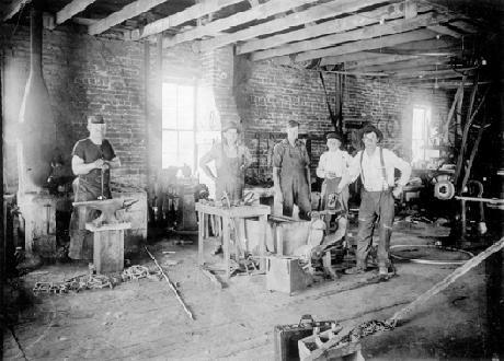 Workers In a Blacksmith Shop