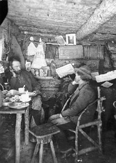 Two Miners In Their Cabin