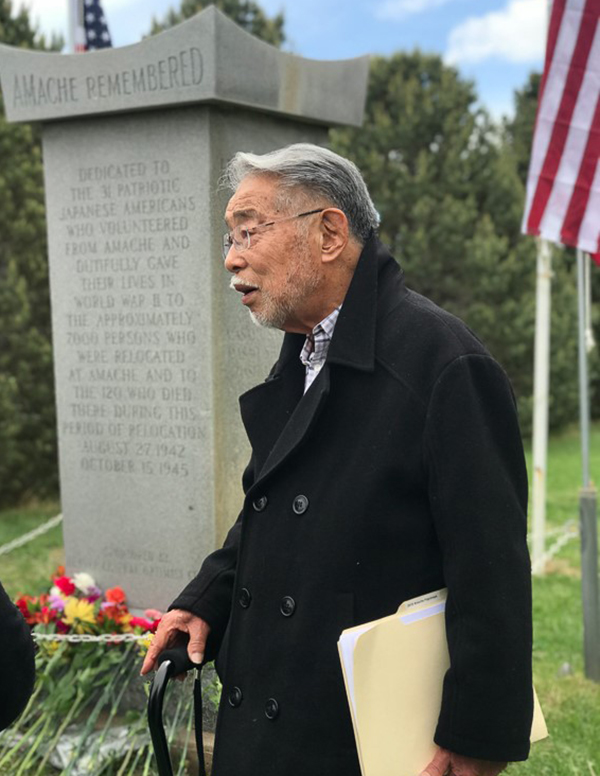 Minoru Tonai speaking at the annual memorial service at the Amache Cemetery in May 2018.