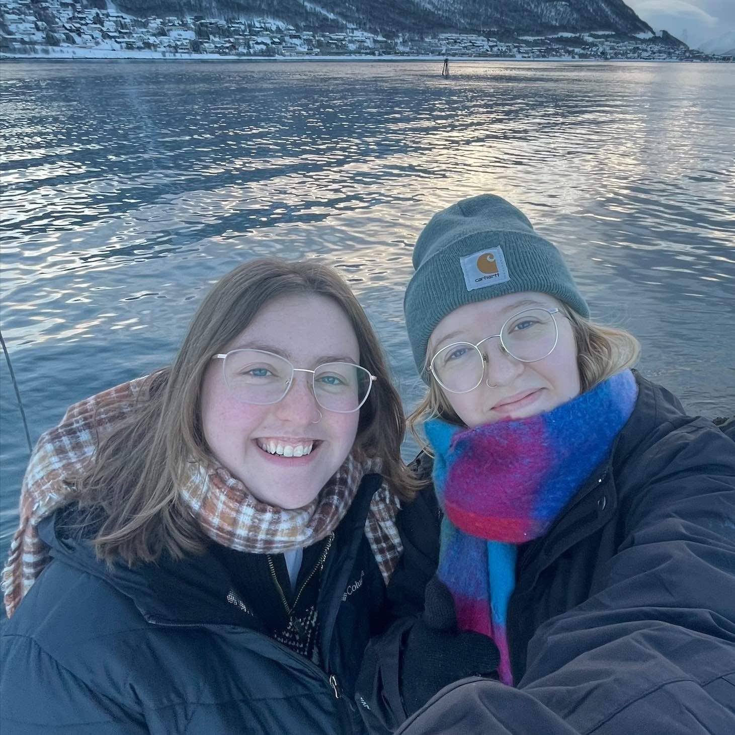 Kennedy Dechant and Penny Nichol in front of a snowy mountain