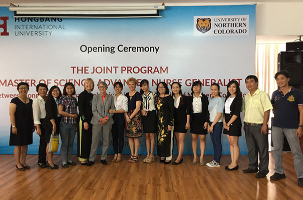 Students in the new program join UNC School of Nursing Director Faye Hummel, fifth from left, Provost Robbyn Wacker, next to Hummel, and Assistant Professor Katrina Einhellig during an introductory ceremony Friday in Ho Chi Minh City.