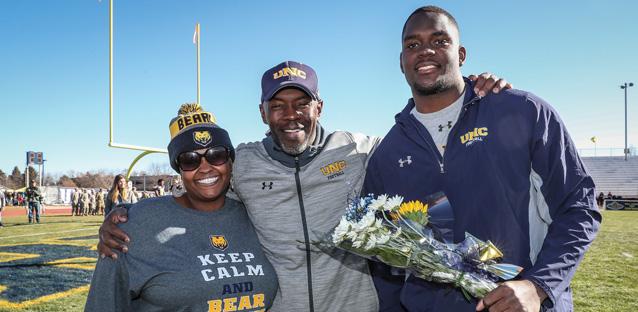 At Senior Day last November, Samad is with Coach Collins (center) and Aleshia Armour (married to Coach Armour). Aleshia makes the occasional meal for players and spoke highly of UNC athlete Brianna Pardner to Samad. Photo by Rob Trubia