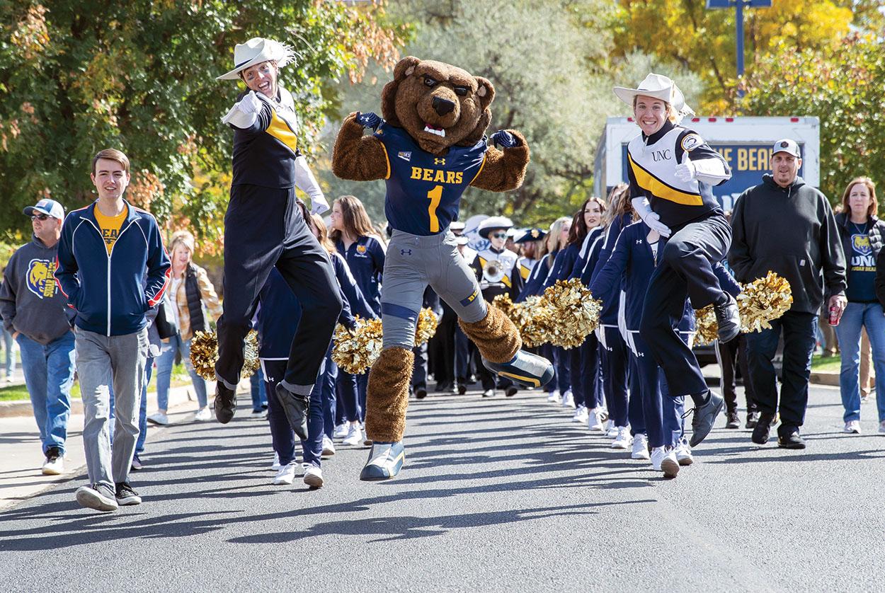 Klawz and the Marching Band in the 2023 Centennial Homecoming Parade