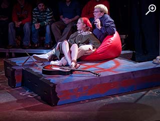 Student performers on stage