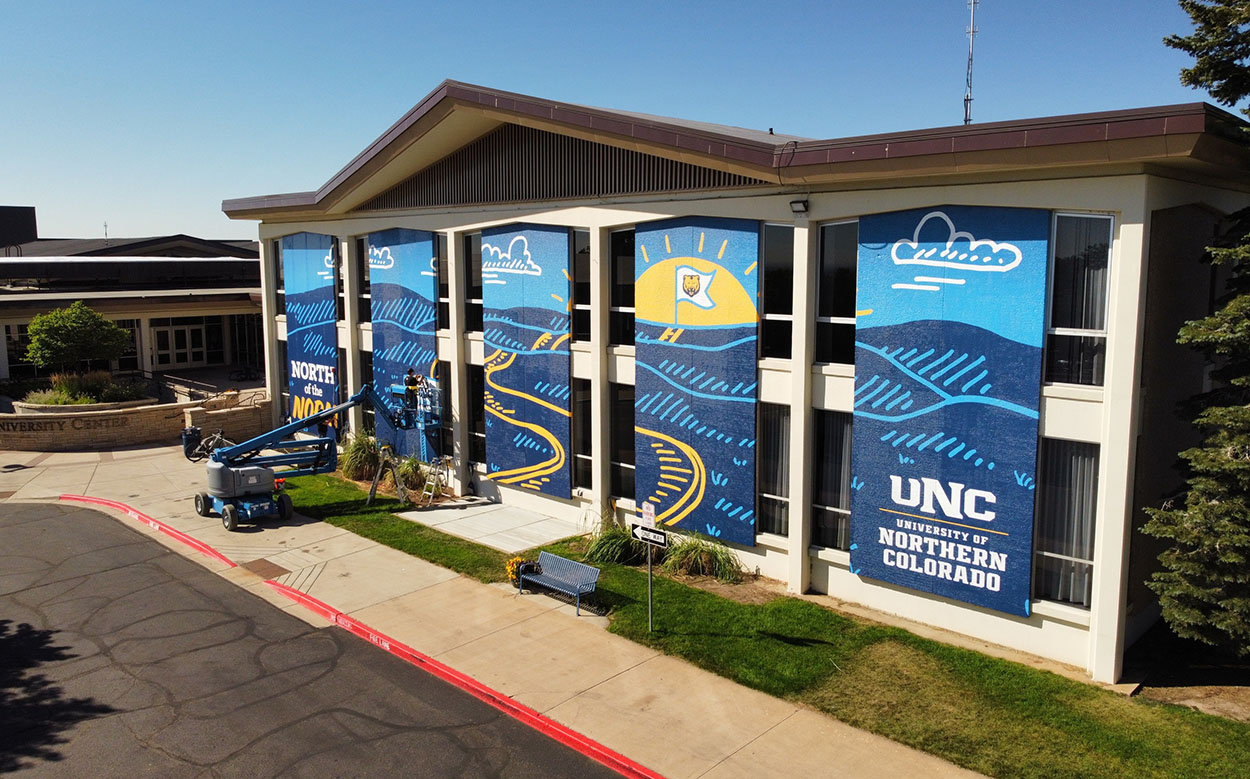 banners hanging from the front of a building