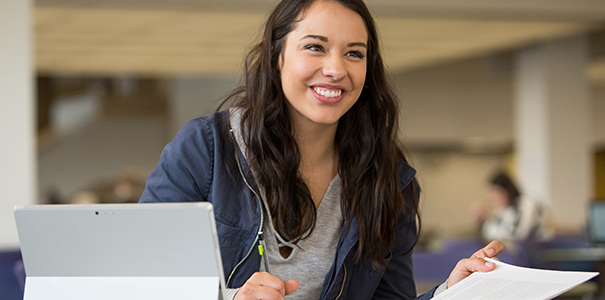 Female studying in library