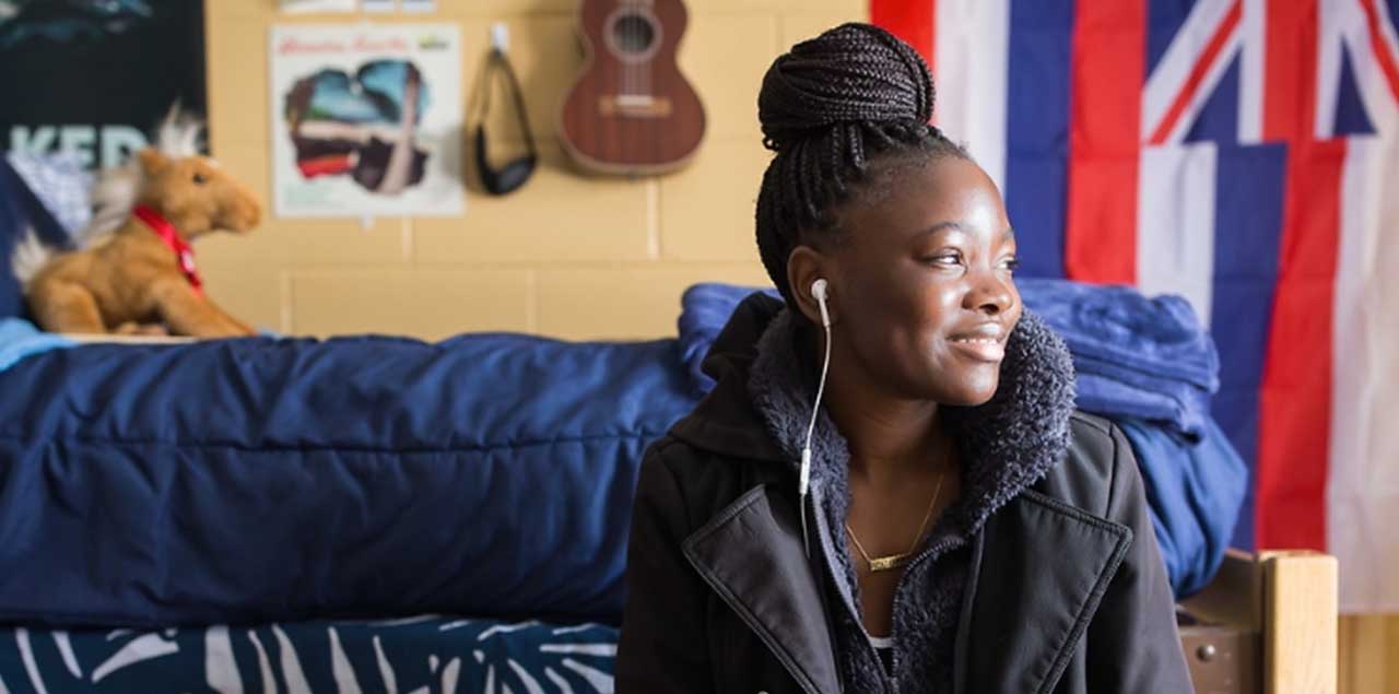 A UNC student in their dorm