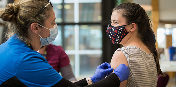 Medical staff on campus doing vaccines.