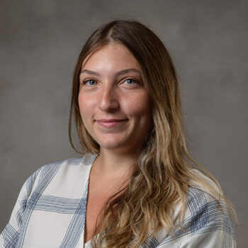 Caterina Belle Azzarello-Nichols facing forward and smiling.