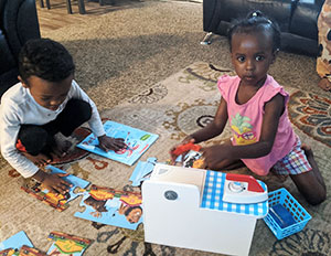 Kids exploring the items in their bags