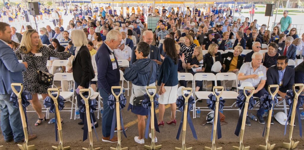 President Feinstein talking to a large crowd