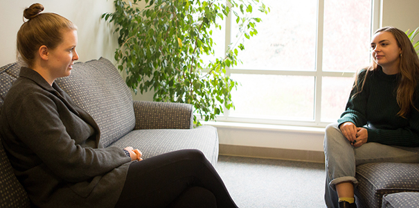 Student talking to counseling at the center