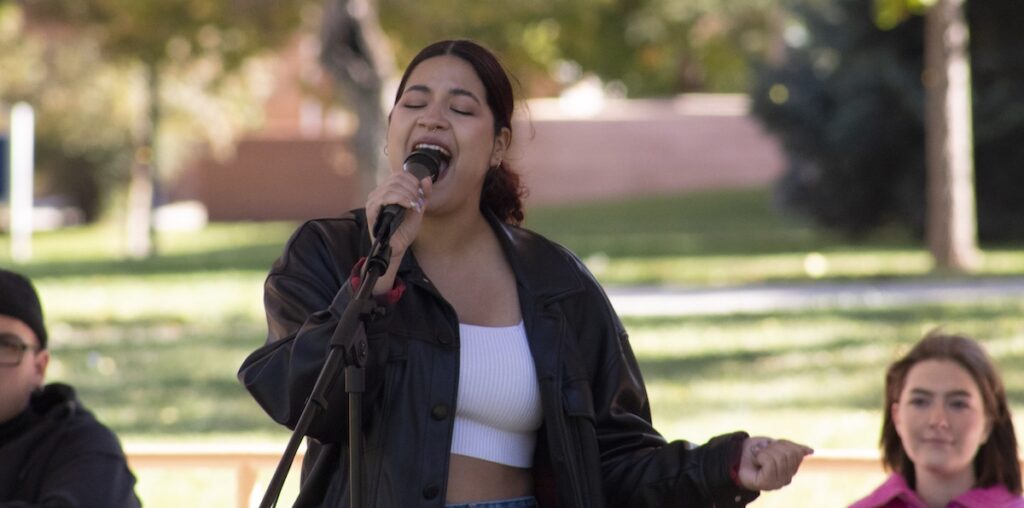 Andrea Camacho performing in the Garden Theatre.