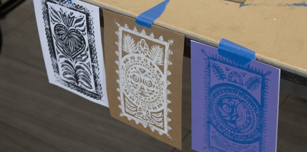 Some of the available designs one could have chosen to make a block print on a card. The designs were created by a faculty member in the visual arts department and were laser cut in the Arts Annex.