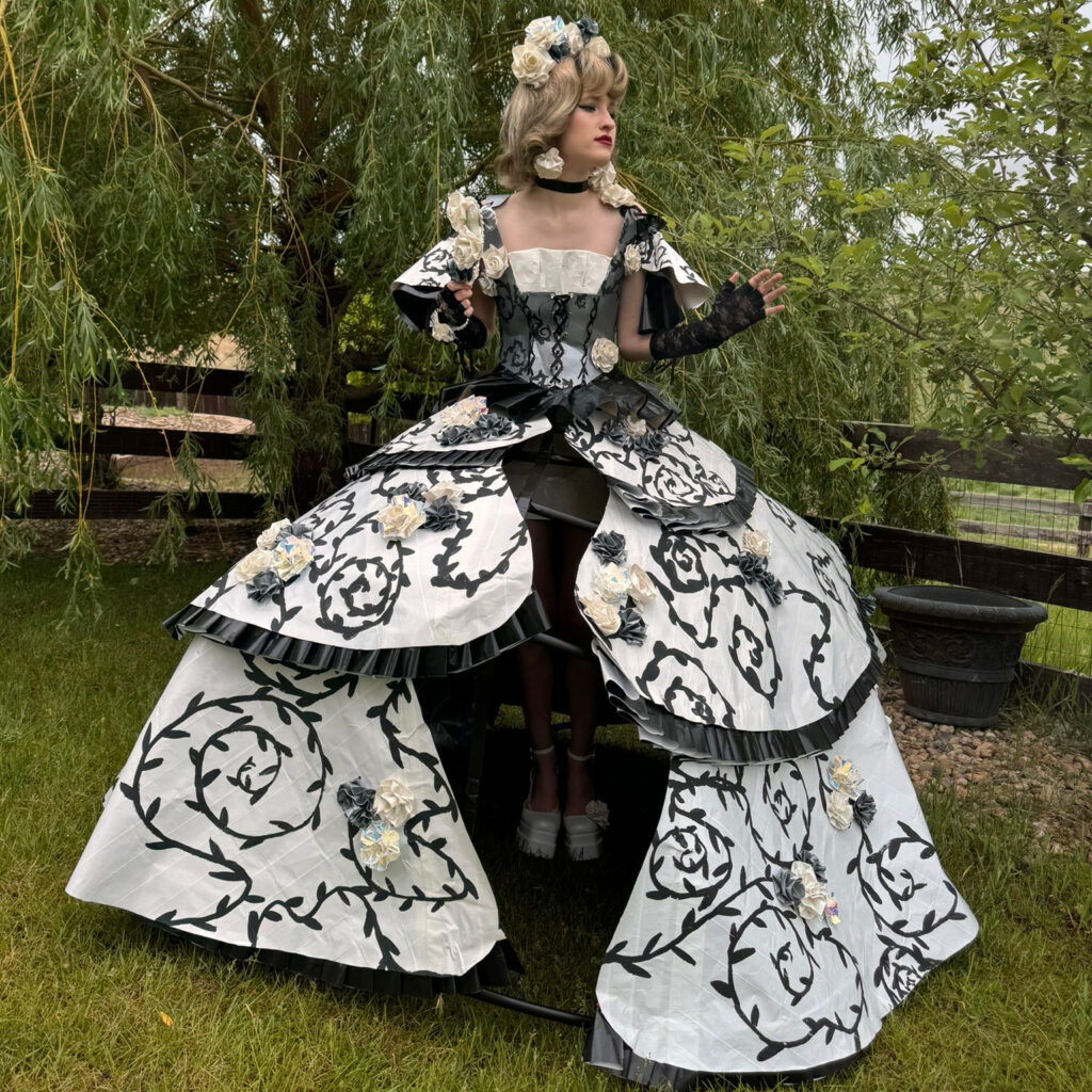 Victoria wearing her black and white dress made out of duct tape