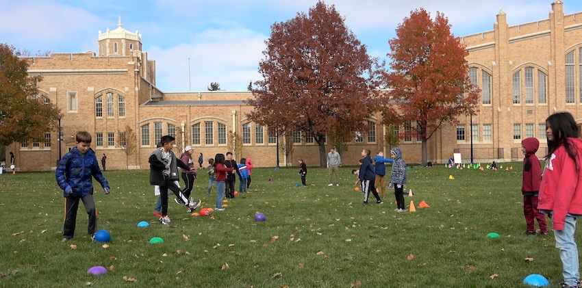 Fred Tjardes students playing soccer in Gunter Field