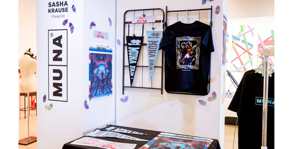 Colorful blue and black design elements on flags and tshirts