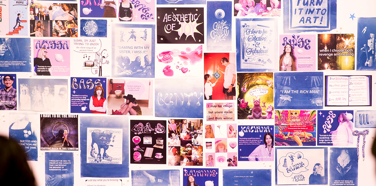 Collection of graphic elements in shades of purple and pink on a white wall