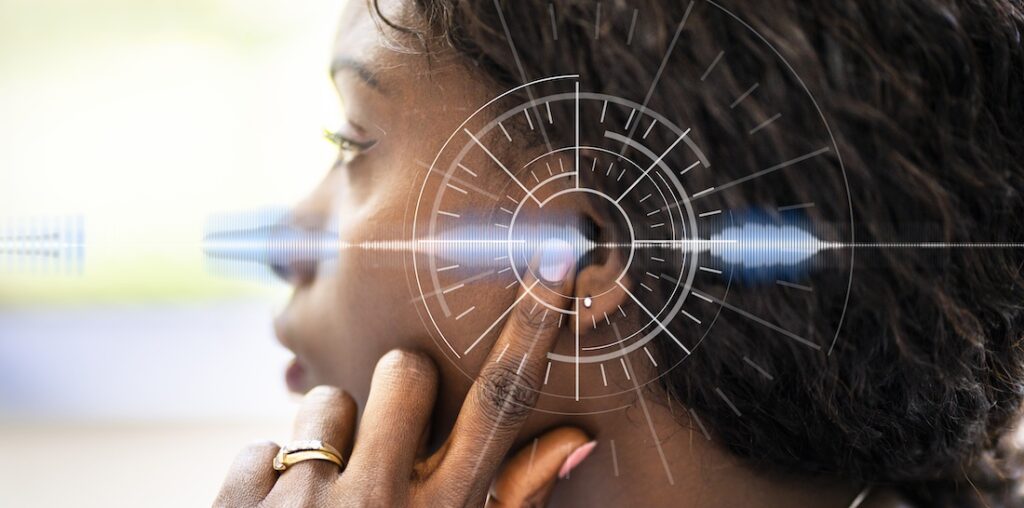 A graphic of a person touching their ear