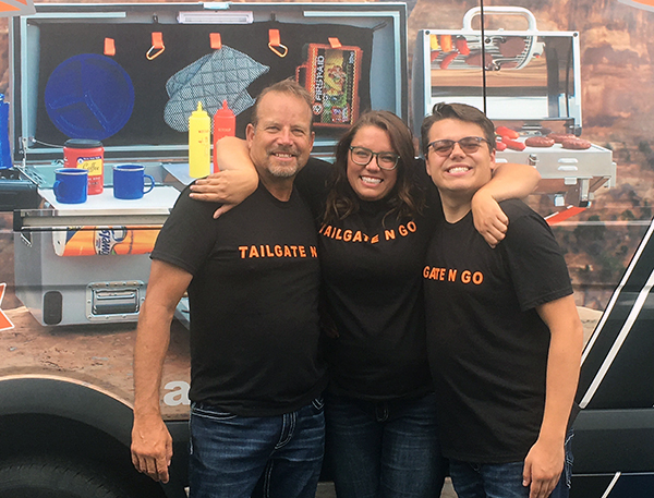 The Johnson family in front of their Tailgate N Go product