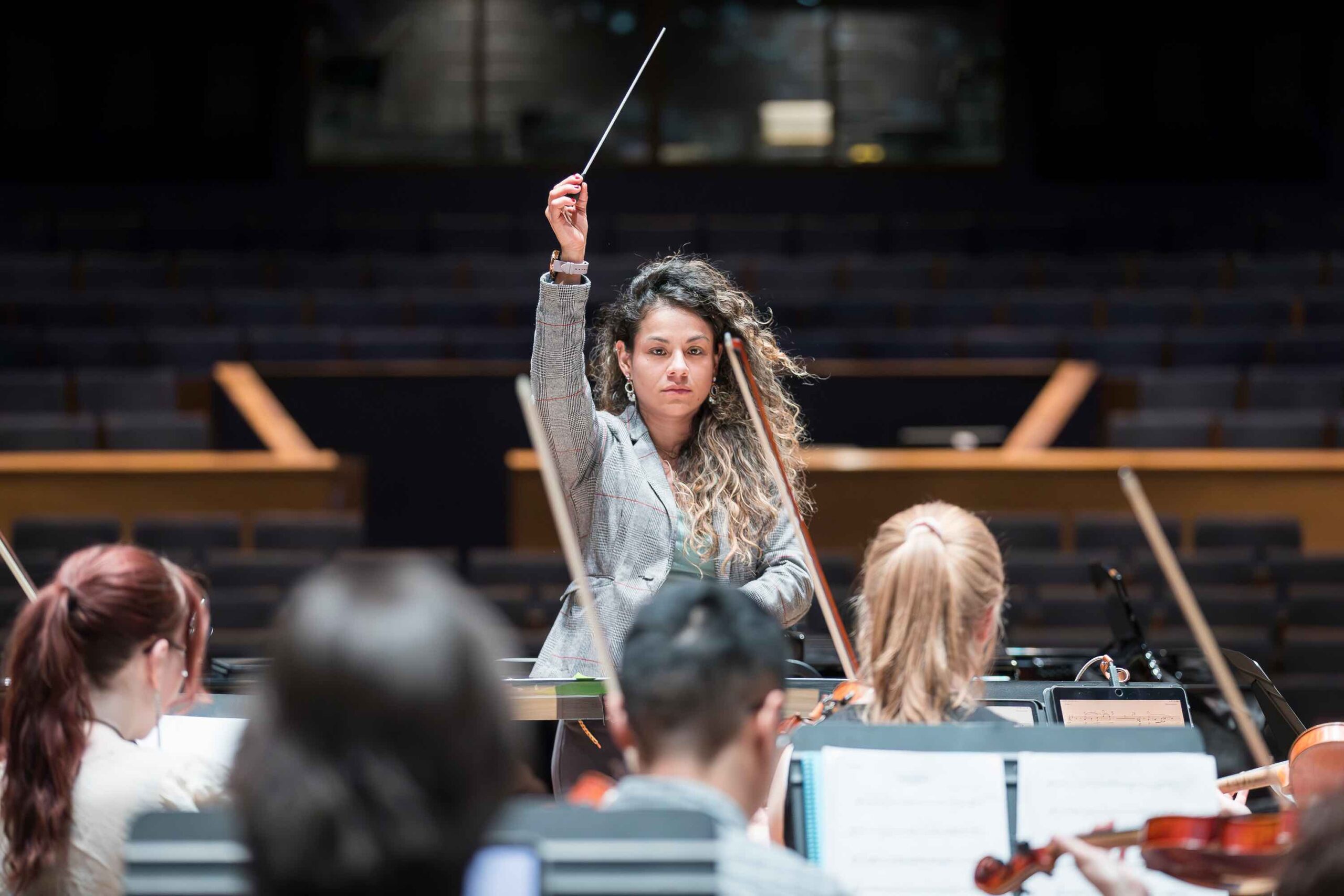 Jolie González Masmela conducting UNC orchestra