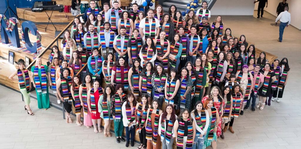 a group of graduating students with sarape stolas