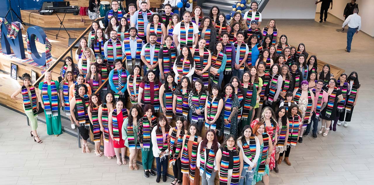 a group of graduating students with sarape stolas