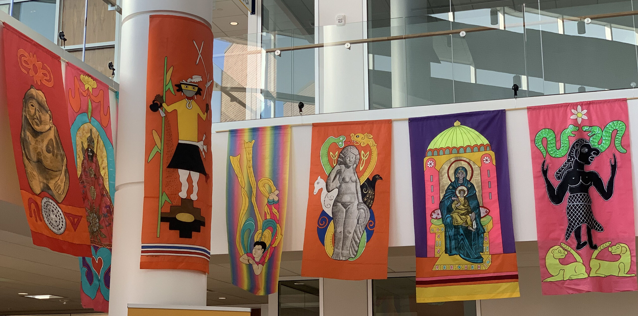Late Lydia Ruyle's prayer flags displayed inside the Campus Commons in celebration of Women's History Month.