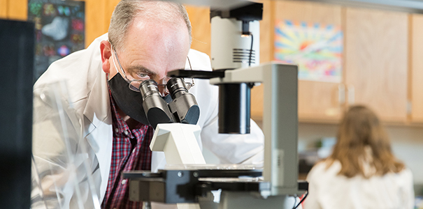 Patrick Burns working on research as part of the grant in his lab at UNC
