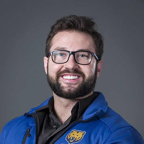 Ryland townsend facing front and smiling at the camera.