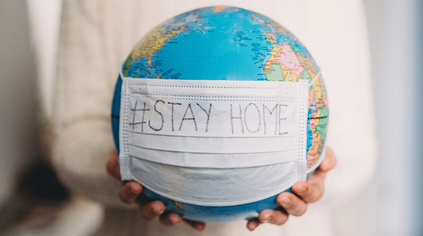 Globe with mask on it stock image