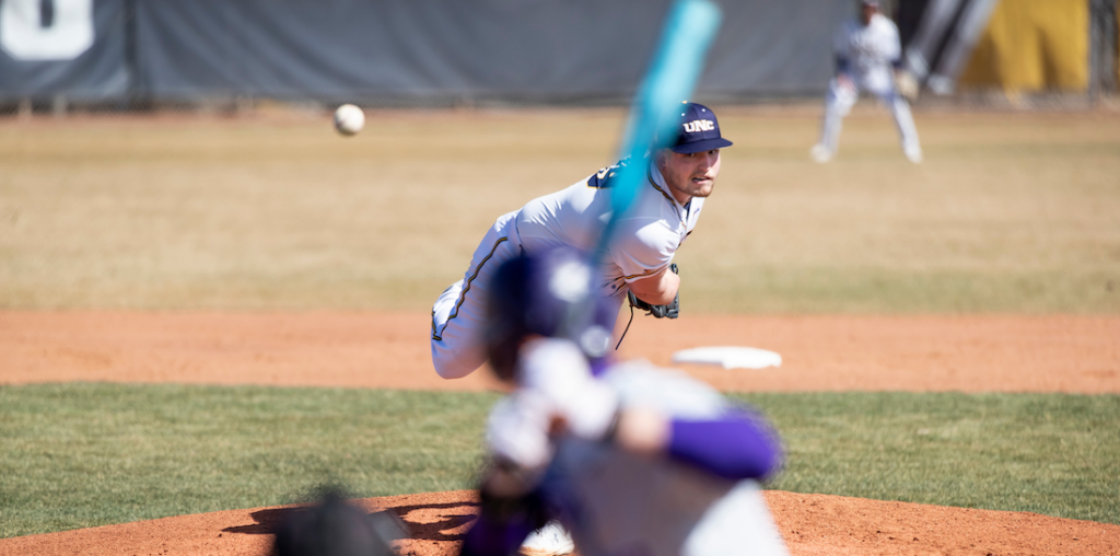 A UNC pitcher throwing a baseball
