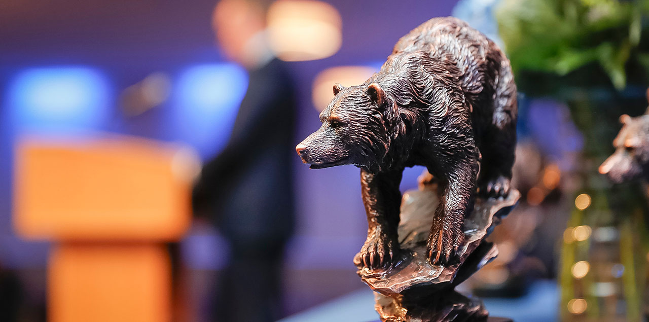 The Bear award Honored Alumni recipients receive