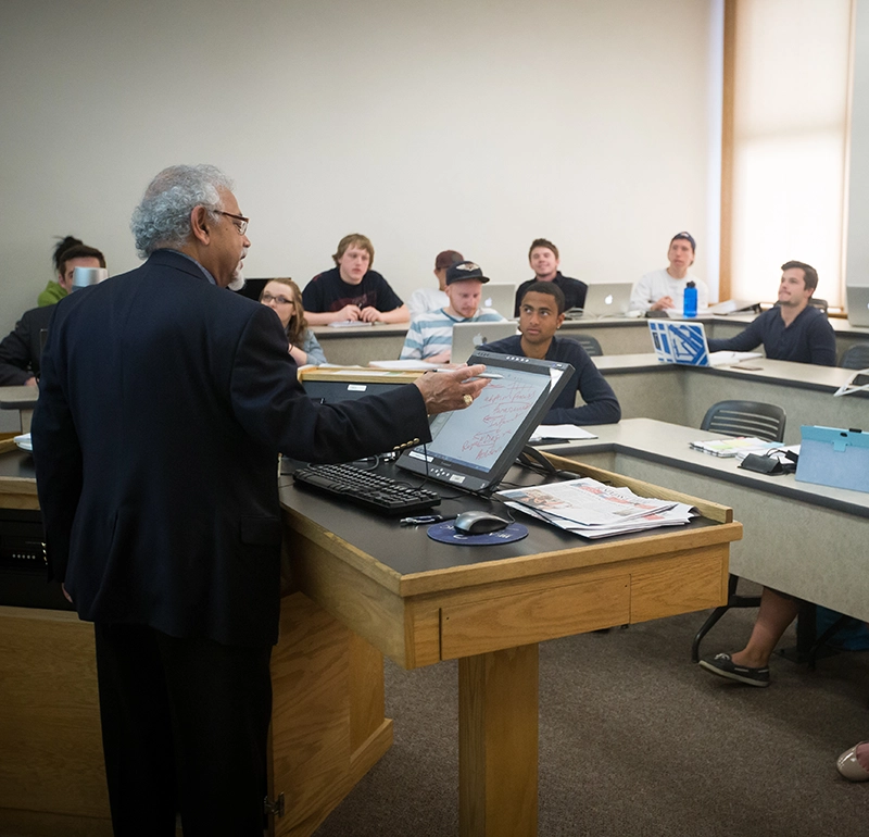 Faculty teaching in a smart classroom.