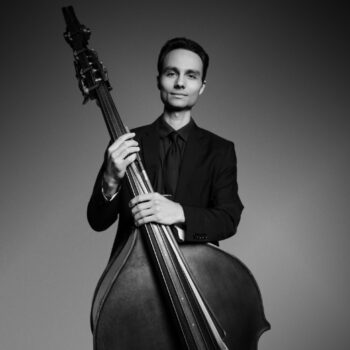 Headshot of August Ramos.