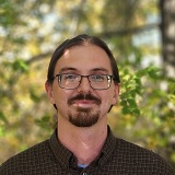 Headshot of Joe McAllister.