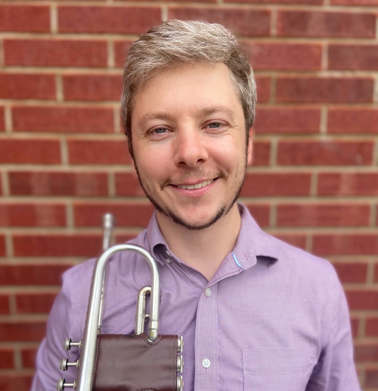 Headshot of Miles Roth.