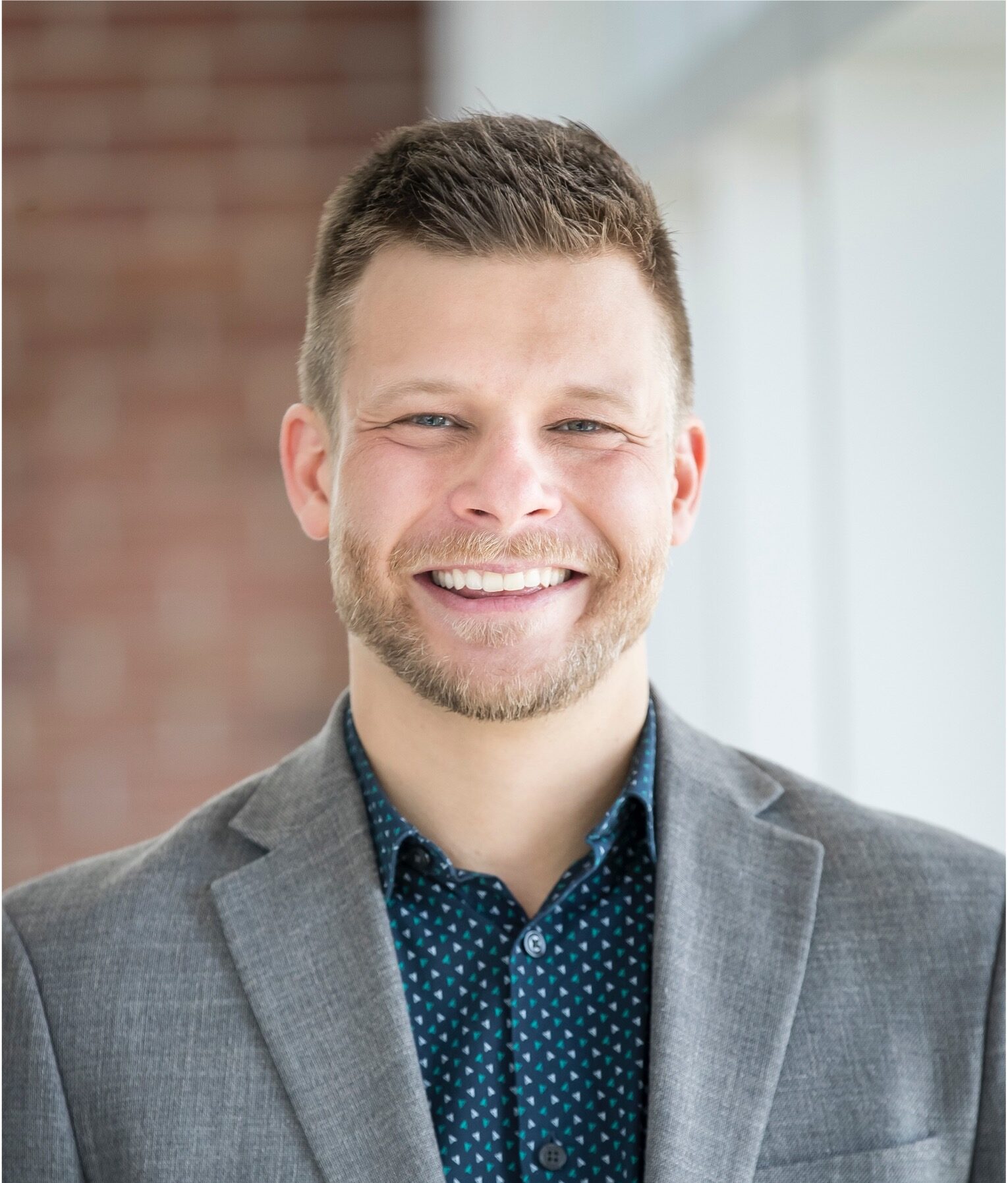 Headshot of Drew Zaremba.