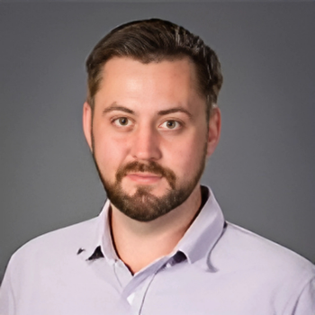 A headshot for Will Tranter