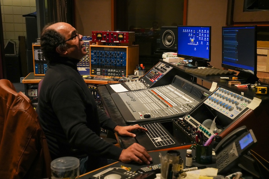 Socrates Garcia working in the recording studio.