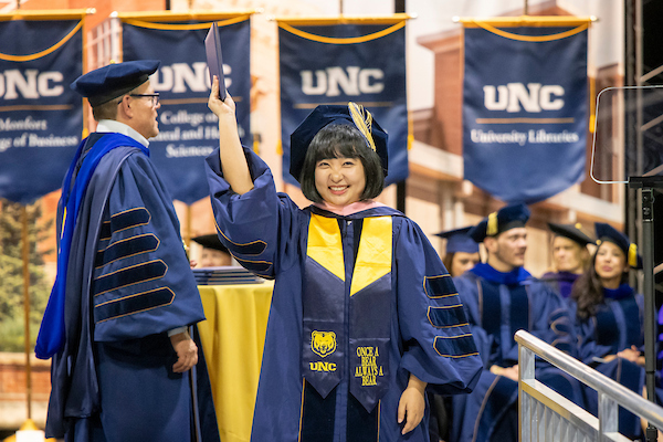 Amber Yanlu Li graduating with a DA in Choral conducting in Spring 2025.