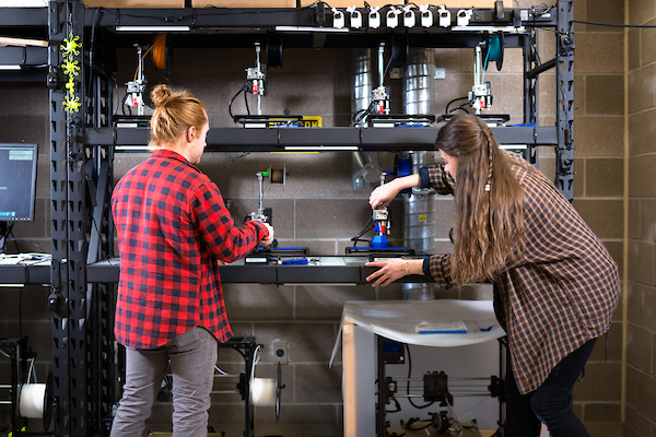 Students working in the School of Art & Design's Digital fabrication Lab.