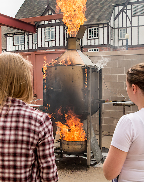 Art students working with metals.