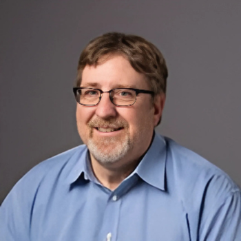 A headshot of Ken Clavir.