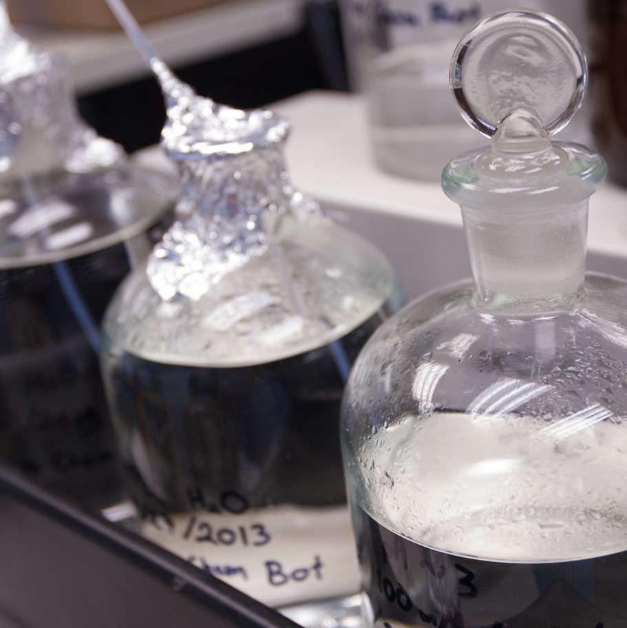 Closeup of a chemistry set containing chemical substances.