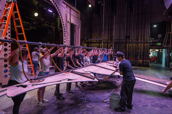 Design and Technology students working on a set for the School of Theatre and Dance.