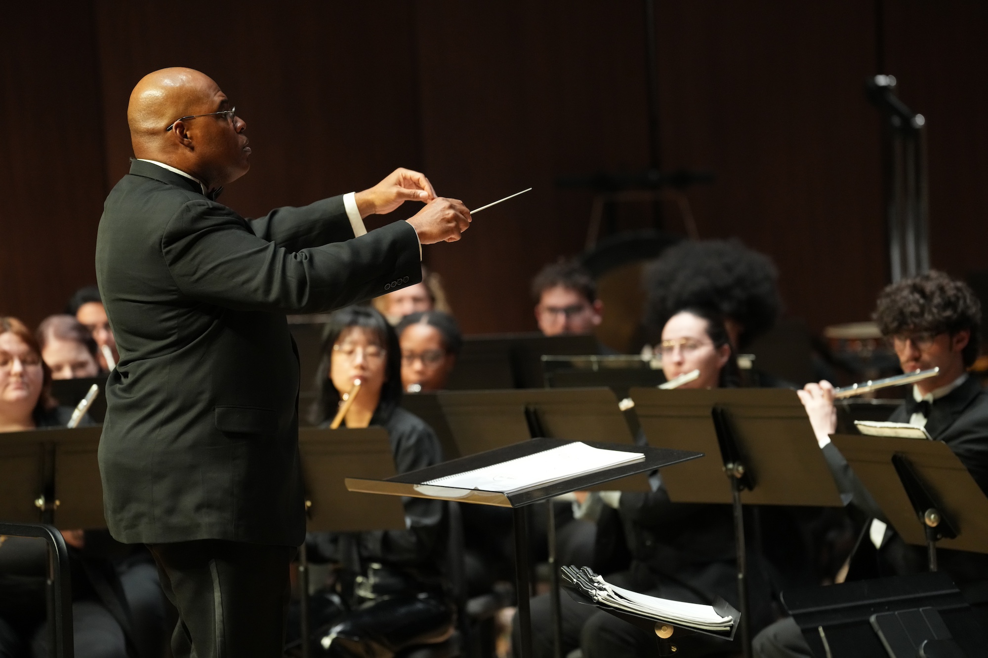 Faculty Wesley Broadnax conducting.