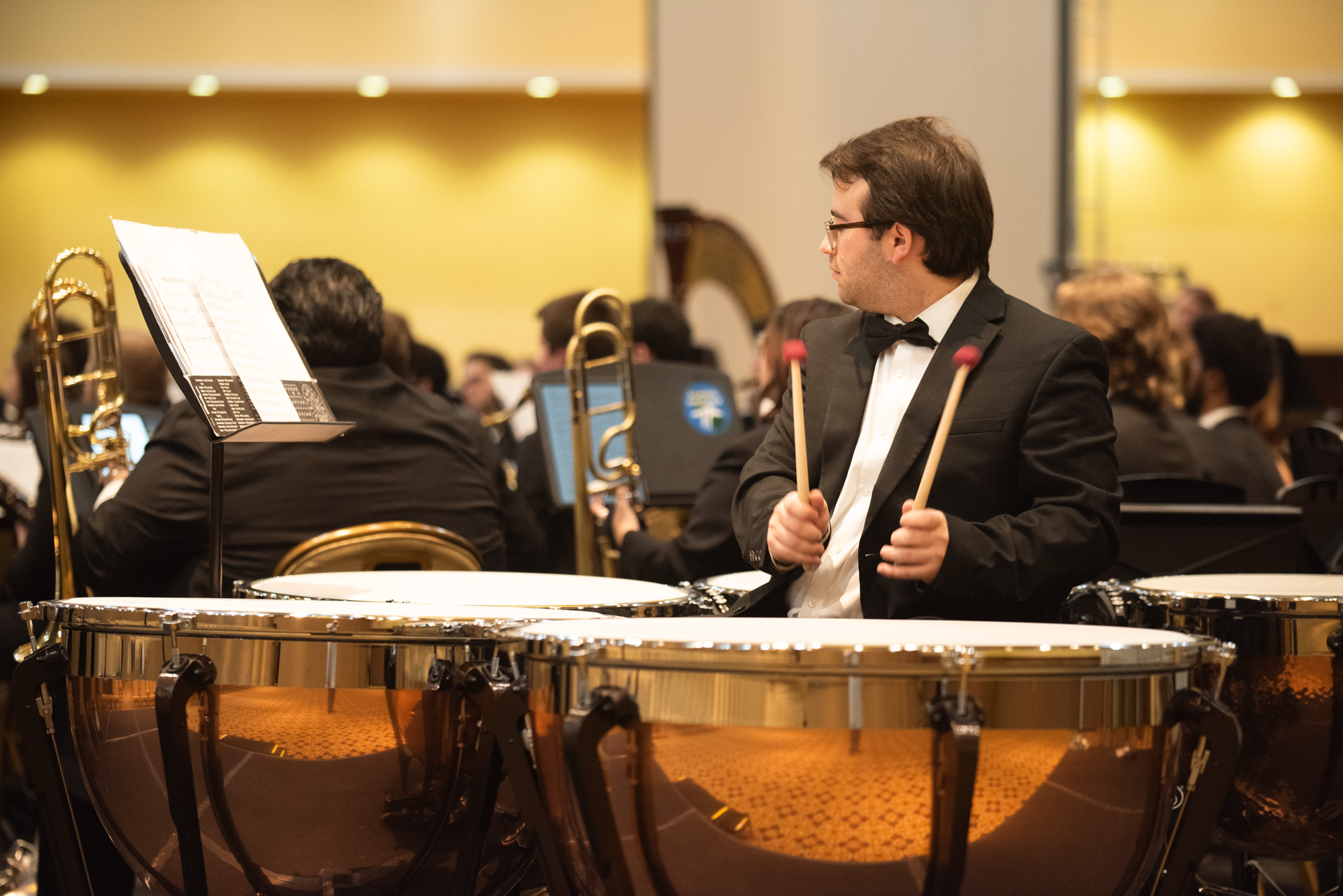 Student performing percussion