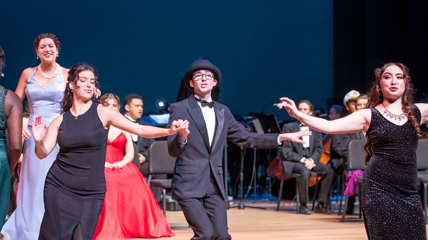 UNC students performing on stage in Campus Commons Performance Hall for Titanic: The Musical.
